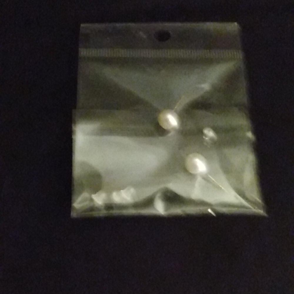 Woman's pearl earrings